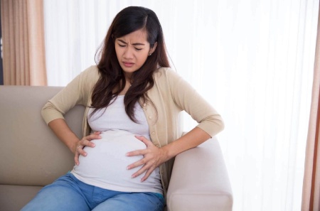 دلایل درد پهلو در بارداری,درد پهلوی چپ در بارداری,درد زیر شکم در بارداری