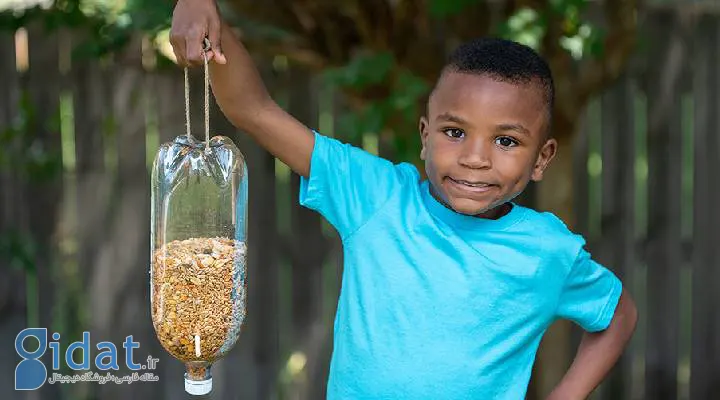غذاخوری پرندگان با چوب بستنی و بطری نوشابه