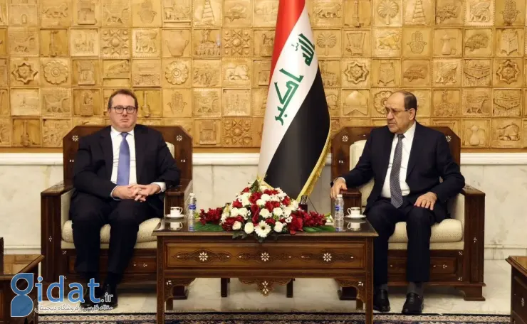 عکسی از دیدار یک مقام آمریکایی با یک حامی ایرانی در عراق