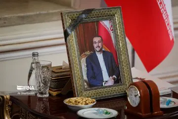 تصویری از داماد حداد عادل در مراسم چهلمین شهید وزیر امور خارجه