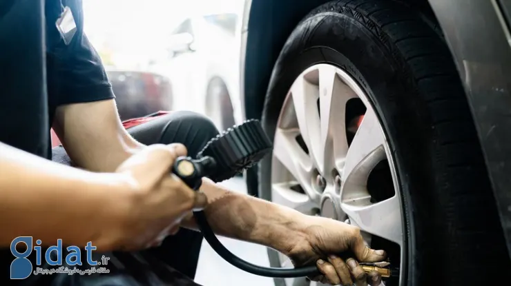 tire-blowout-warning-signs-1-tire-pressure-gauge-being-used-to-check-pressure