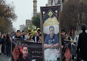 پیکر جانباز شهید غلامحسین حدادی در قم تشییع شد