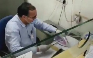 ایده خلاقانه کارمند بانک برای مبارزه با کرونا