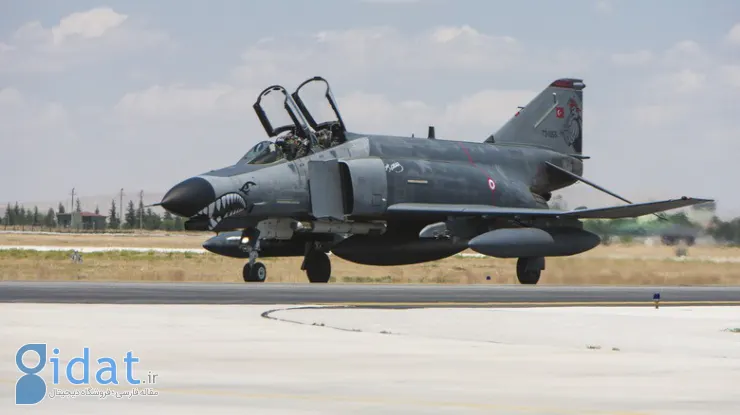 8-an-f-4-with-open-hatch-on-runway